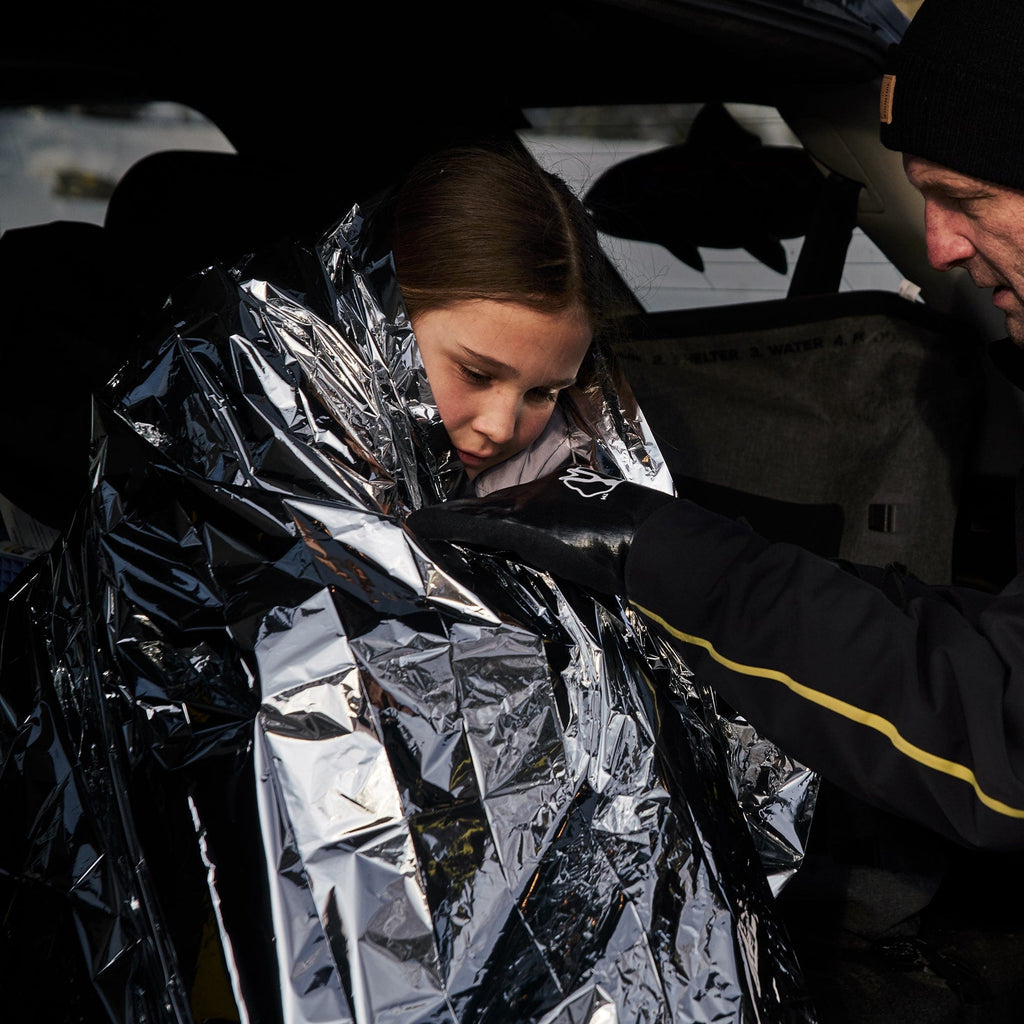 Emergency blanket in use during a roadside stop