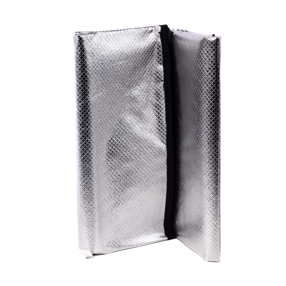 The blanket folded flat, ready for the bag